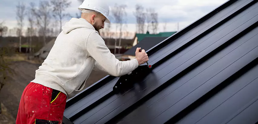 Tin Roof Ridge Cap Installation in Romeoville